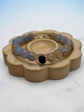 Handmade wirewrapped Blue Bracelet with black accent.